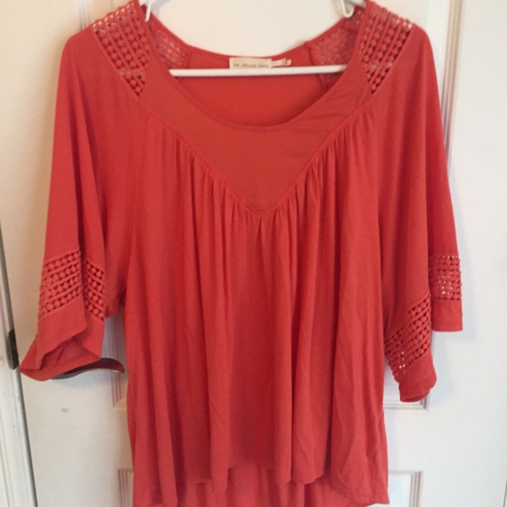 Orange shirt with sleeve details